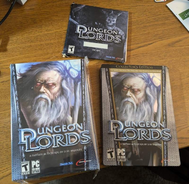 3 versions of the Dungeon Lords PC game - including an unopened original version, an original artwork version, and the collectors edition of the game 3 versions of the Dungeon Lords PC game - including an unopened original version, an original artwork version, and the collectors edition of the game