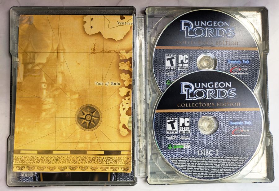 Collector's Edition Case Open and Full of the Map, 3 discs, and User's Manual Collector's Edition Case Open and Full of the Map, 3 discs, and User's Manual